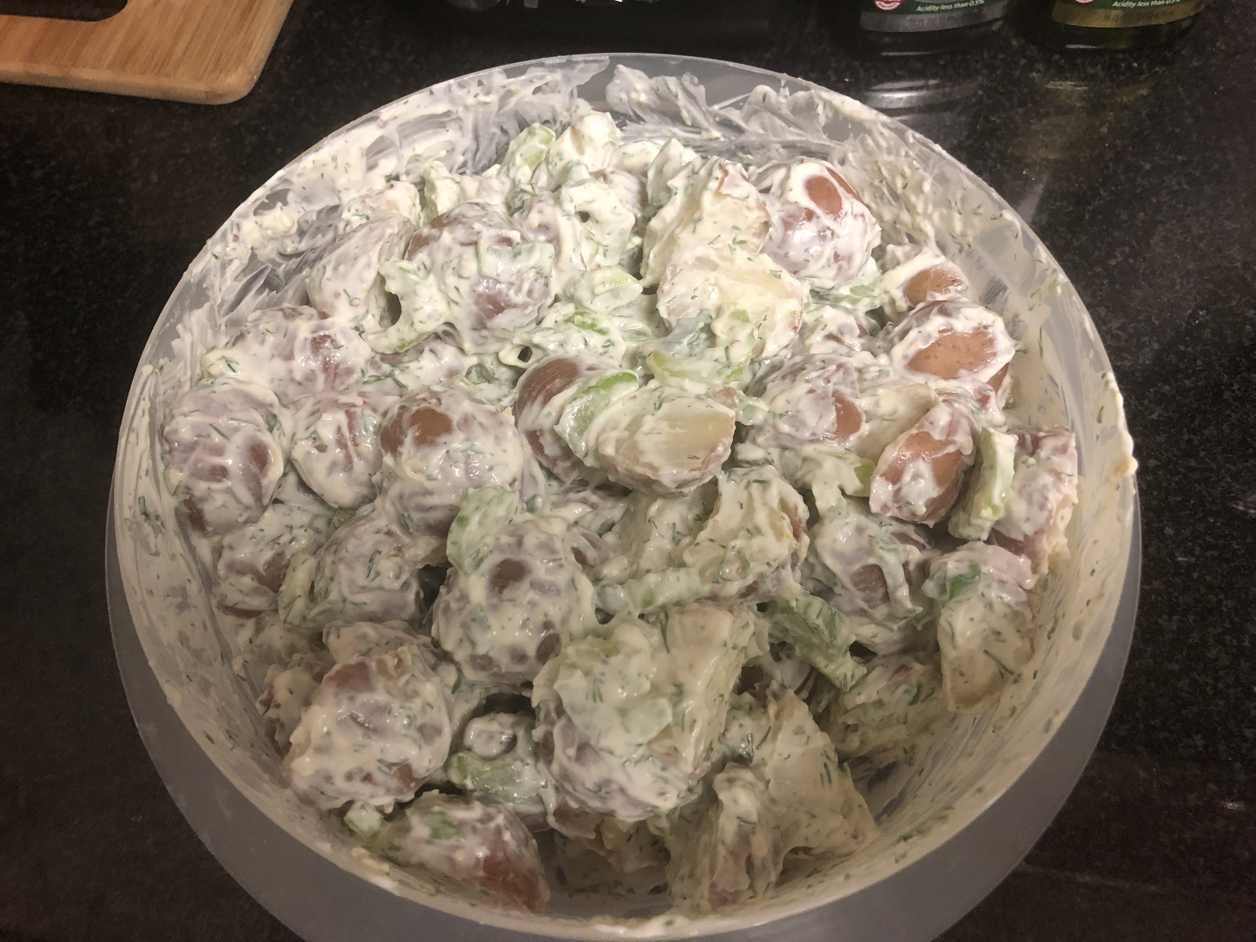 Potato Salad shown filling a large tupperware container