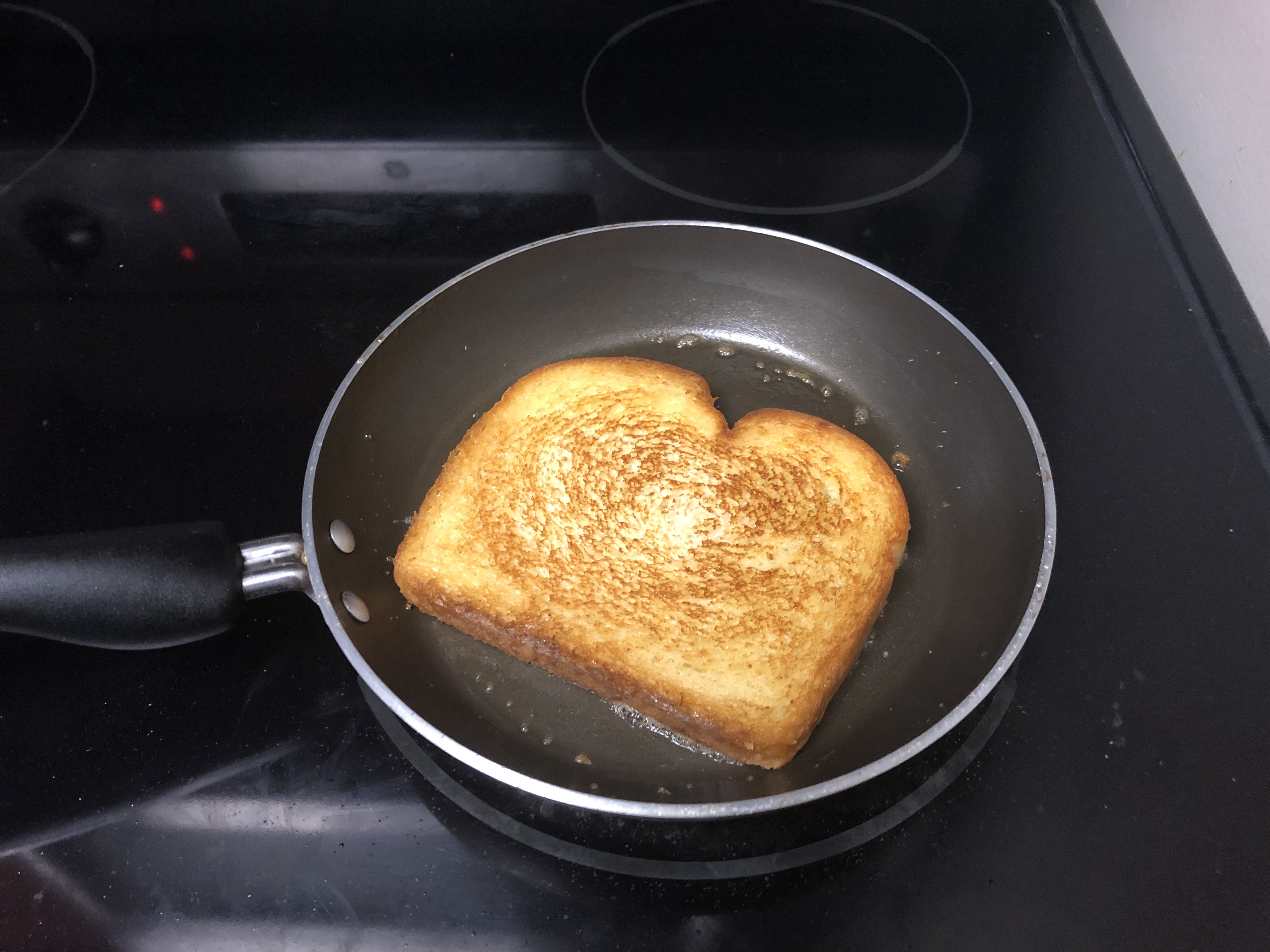 Bread toasting in pan