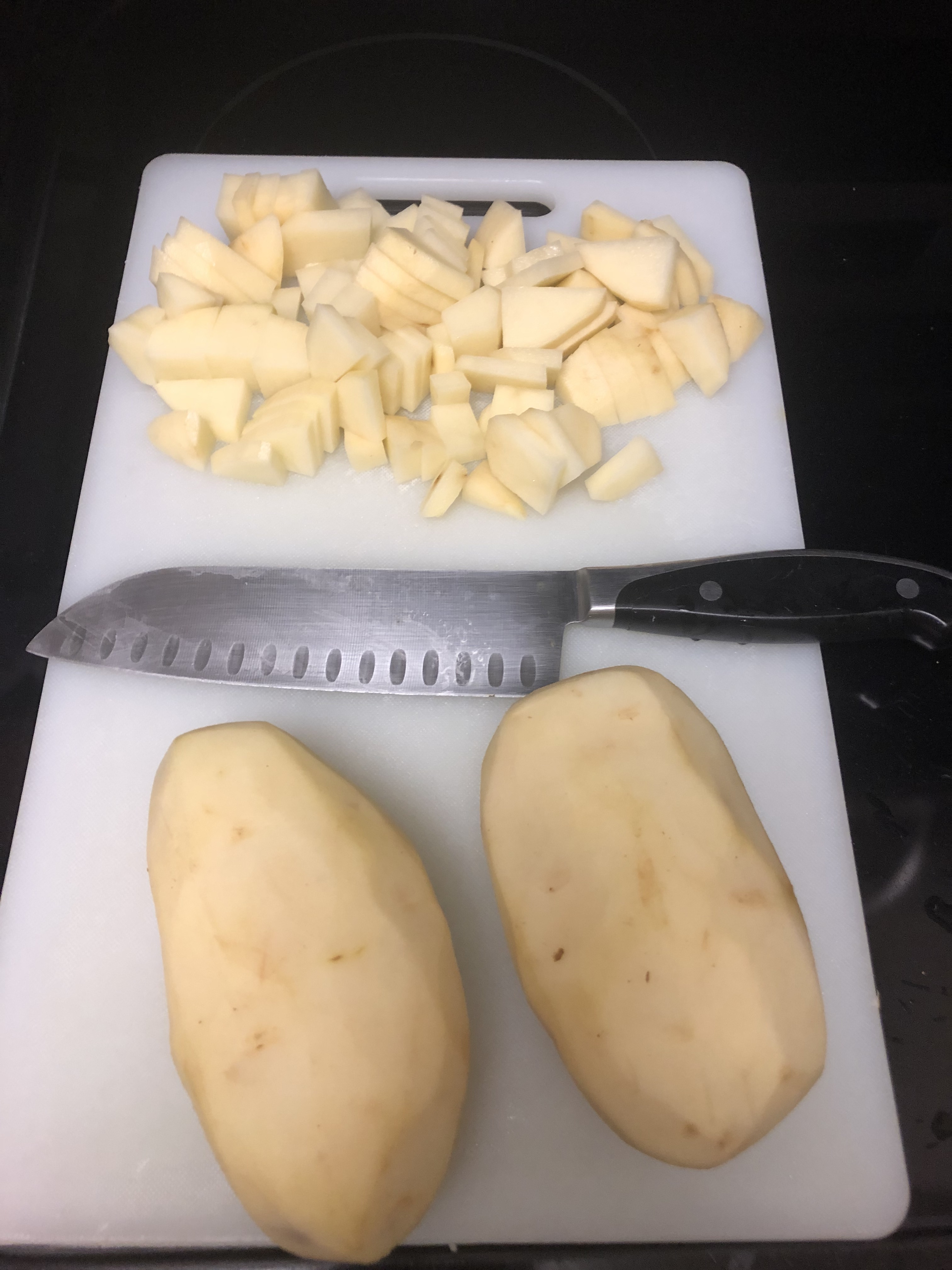 Dicing the peeled potatoes