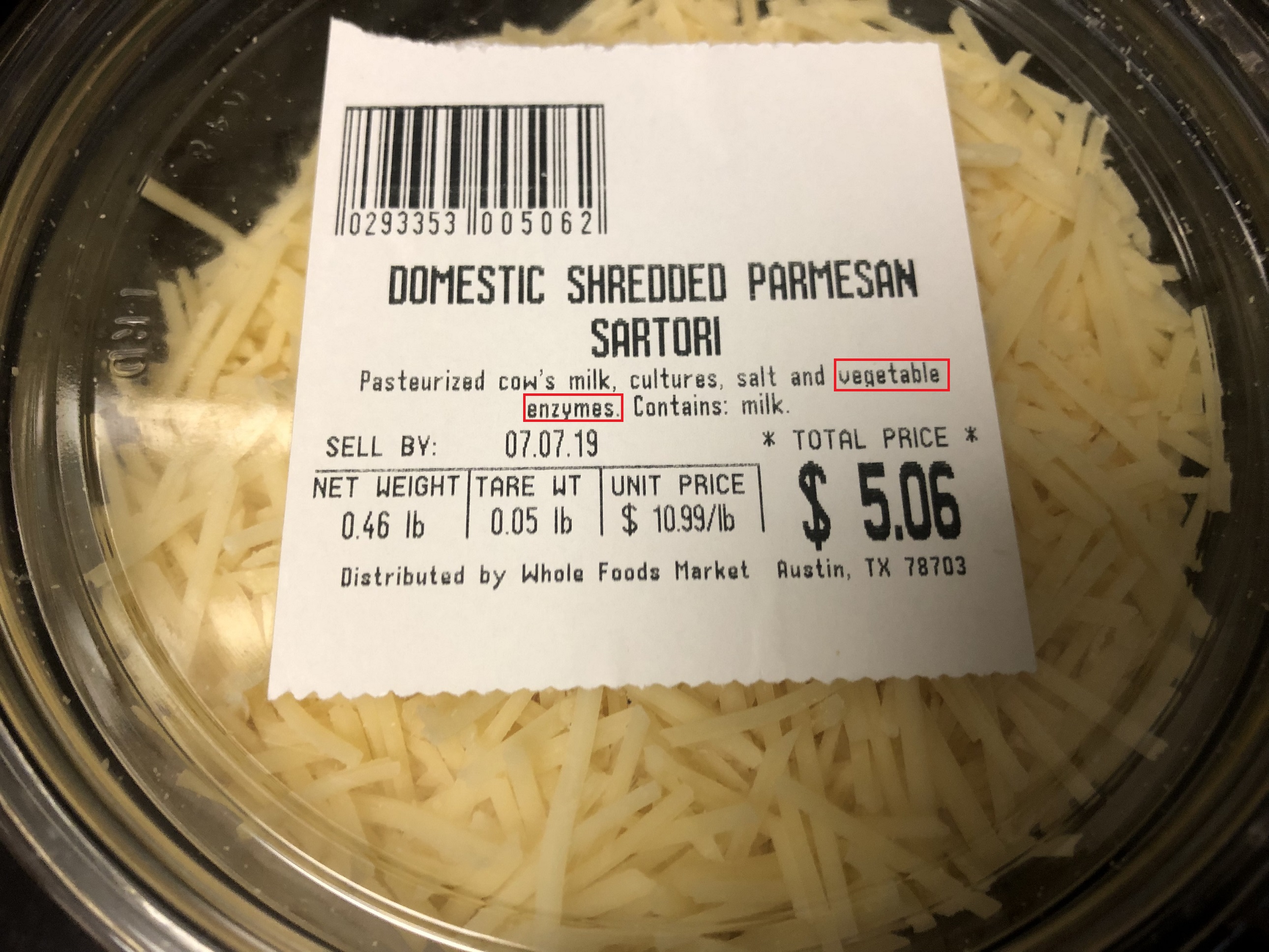 Vegetarian cheddar cheese with the phrase 'vegetable enzymes' highlighted on the label