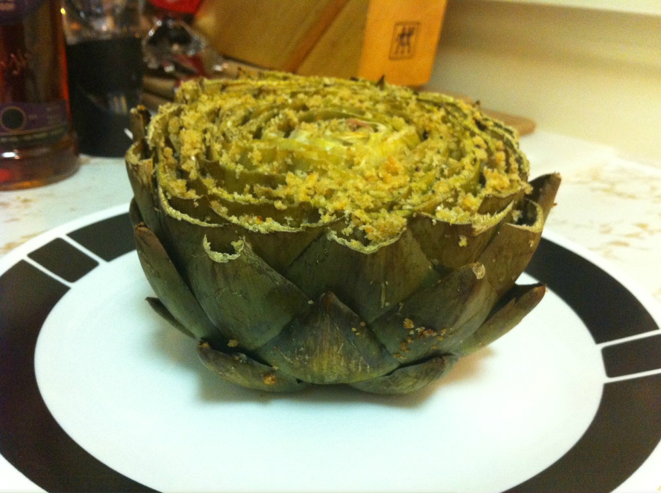 Plated stuffed artichoke