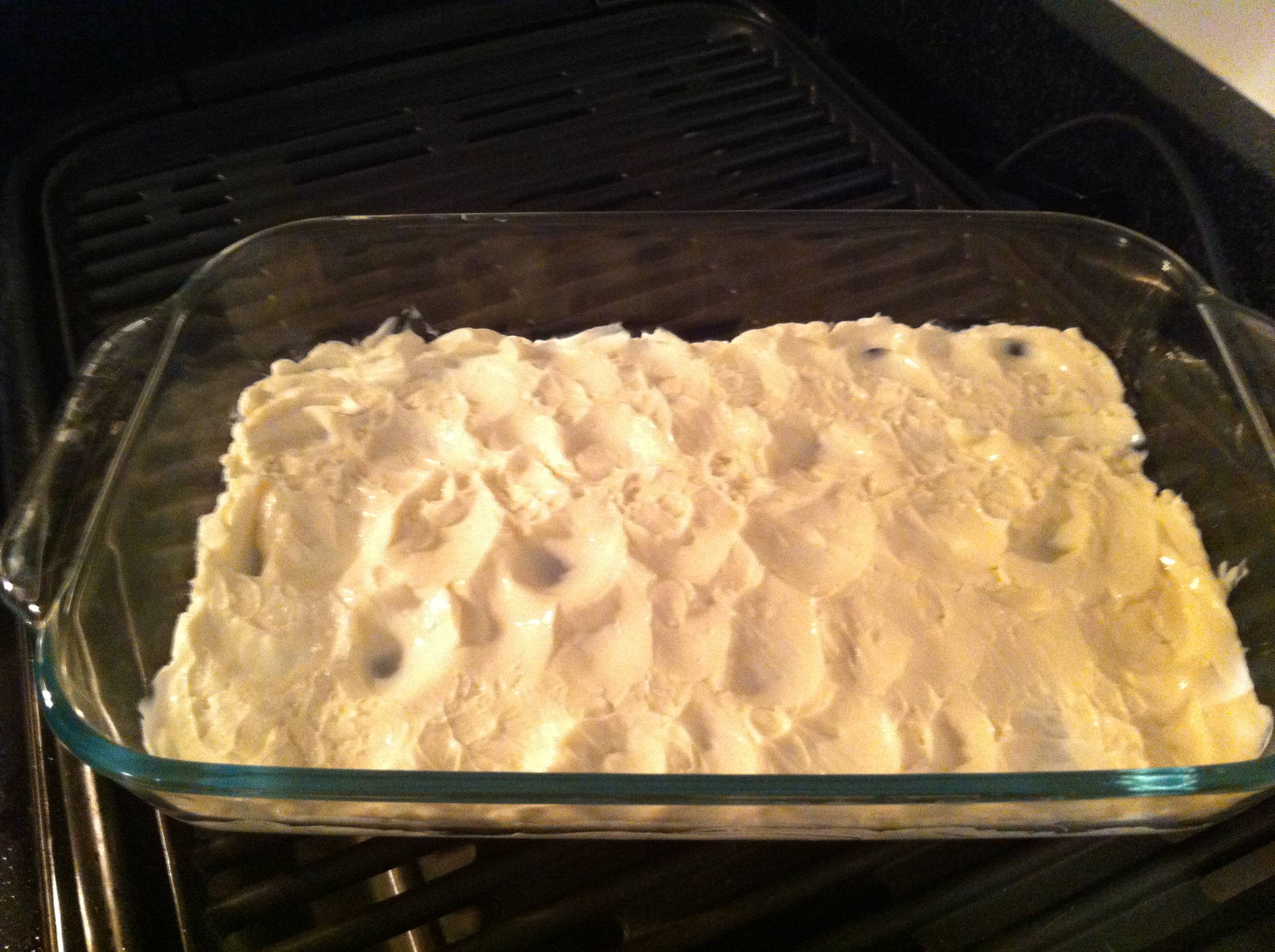 Cream cheese spread on bottom of paking pan